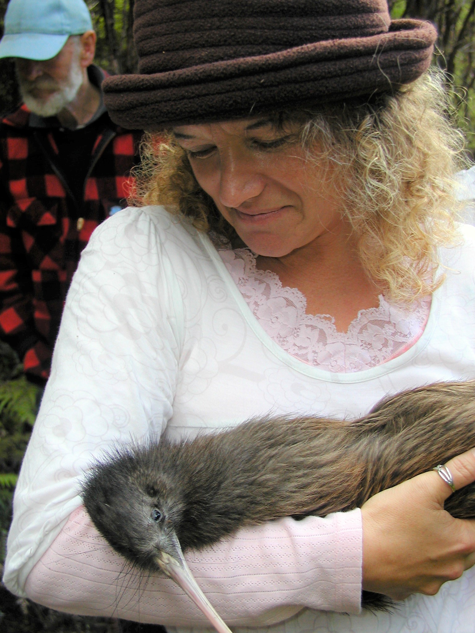 Christine Rose holding a kiwi