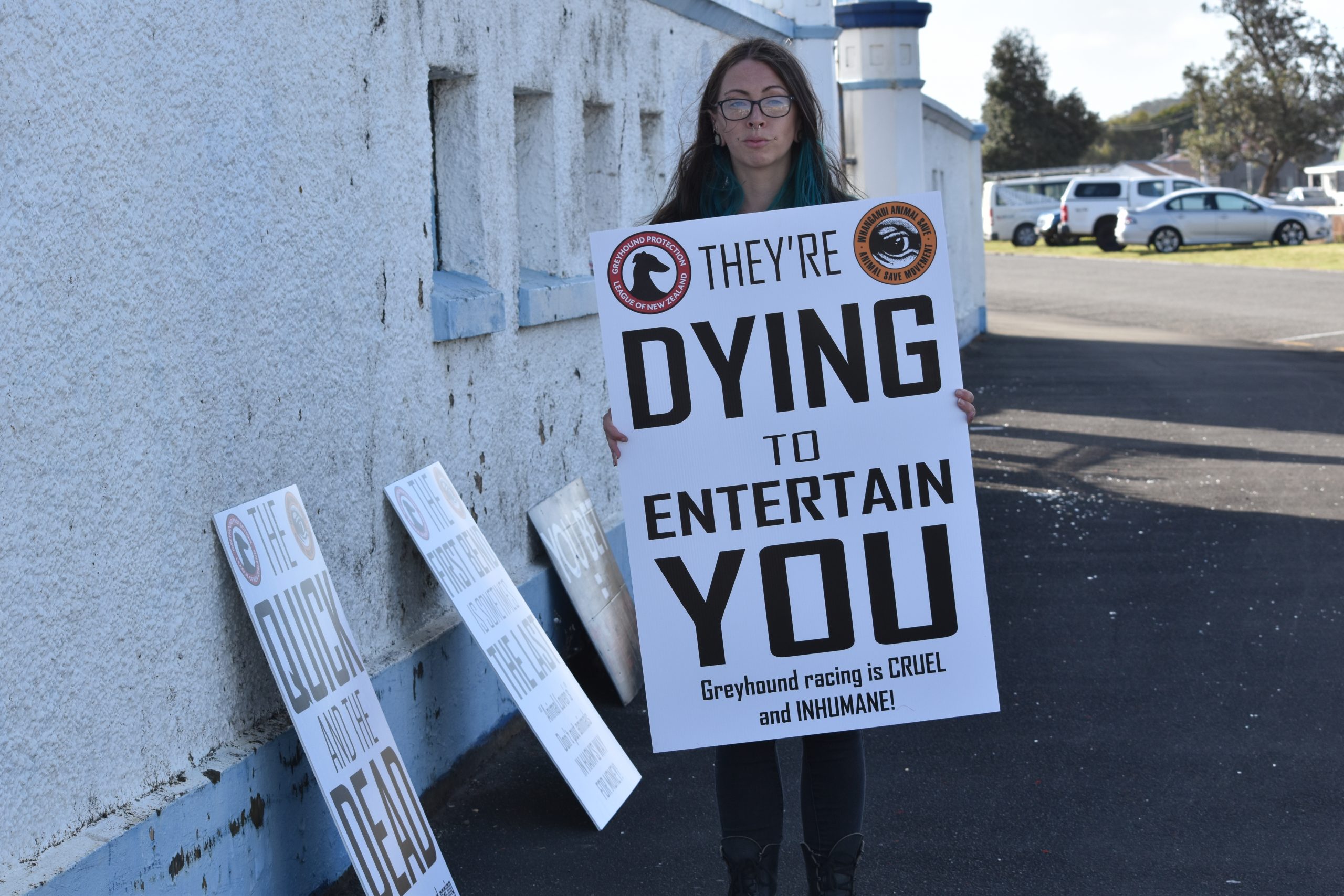 STANDING UP FOR GREYHOUNDS – New Zealand’s First Trackside Greyhound Racing Protest